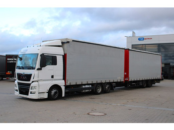 Plachtový nákladní auto MAN TGX 24.500