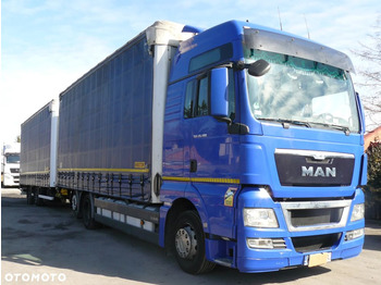 Plachtový nákladní auto MAN TGX