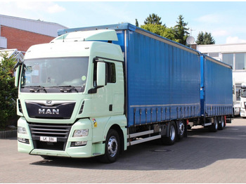 Plachtový nákladní auto MAN TGX 26.460