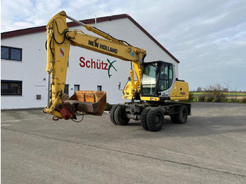 Kolesové rýpadlo NEW HOLLAND