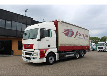 Plachtový nákladní auto MAN TGX 26.440