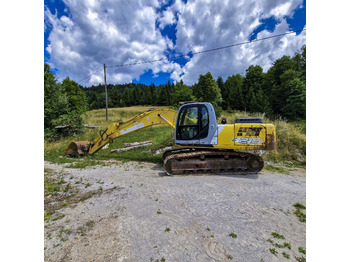 Pásové rýpadlo NEW HOLLAND