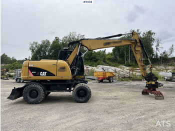 Kolesové rýpadlo CAT M313D with tipping wagon and attachments (VIDEO): obrázek 3