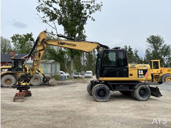 Kolesové rýpadlo CAT M313D with tipping wagon and attachments (VIDEO): obrázek 2