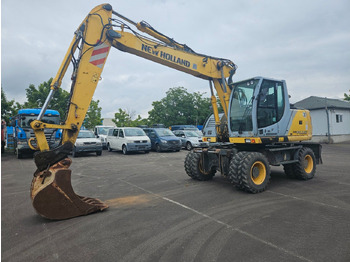 Kolesové rýpadlo NEW HOLLAND