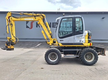 Kolesové rýpadlo NEW HOLLAND