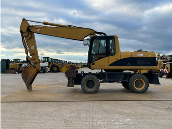 Kolesové rýpadlo CATERPILLAR M318