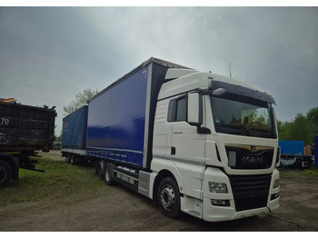 Plachtový nákladní auto MAN TGX 26.460