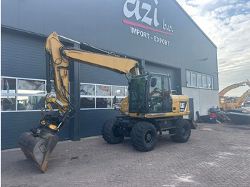 Kolesové rýpadlo CATERPILLAR M313D