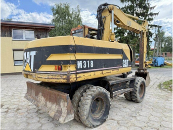 Kolesové rýpadlo CATERPILLAR M318