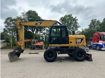 Kolesové rýpadlo CATERPILLAR M313D