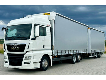 Plachtový nákladní auto MAN TGX 26.460
