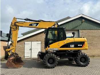 Kolesové rýpadlo CATERPILLAR M316D