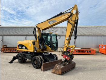 Kolesové rýpadlo CATERPILLAR M318D