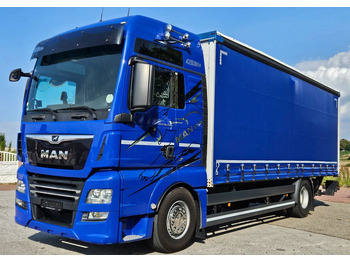 Plachtový nákladní auto MAN TGX