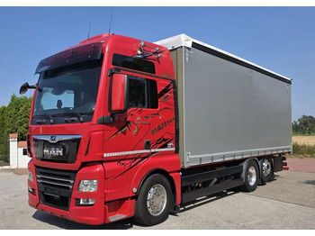 Plachtový nákladní auto MAN TGX 26.500