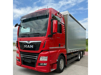 Plachtový nákladní auto MAN TGX 26.500