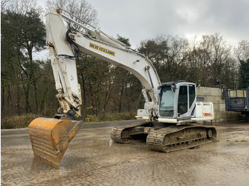 Pásové rýpadlo NEW HOLLAND
