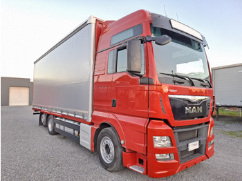 Plachtový nákladní auto MAN TGX 26.440