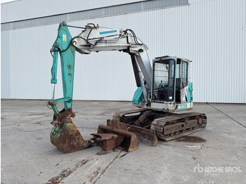 Pásové rýpadlo KOMATSU