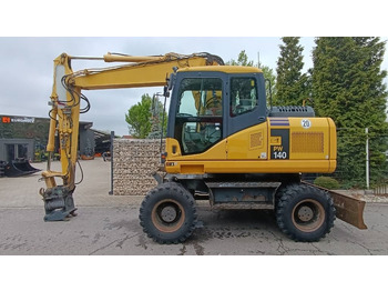 Kolesové rýpadlo KOMATSU PW140