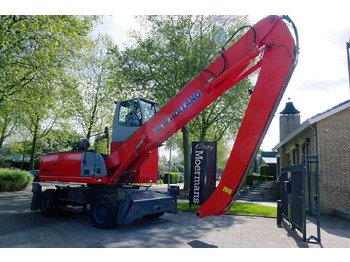 Kolesové rýpadlo NEW HOLLAND