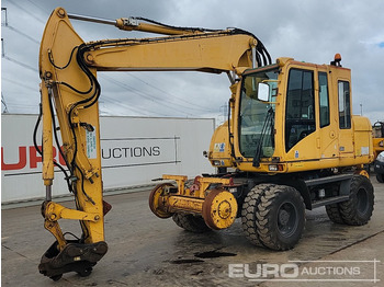 Kolesové rýpadlo CATERPILLAR M313C