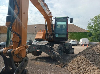 Kolesové rýpadlo CASE