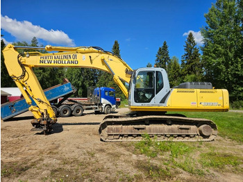 Pásové rýpadlo NEW HOLLAND