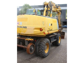 Kolesové rýpadlo New Holland MH5 Plus: obrázek 5 Kolesové rýpadlo New Holland MH5 Plus: obrázek 5