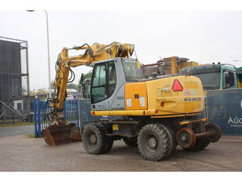 Kolesové rýpadlo New Holland MH5 Plus: obrázek 3 Kolesové rýpadlo New Holland MH5 Plus: obrázek 3