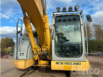 Pásové rýpadlo NEW HOLLAND