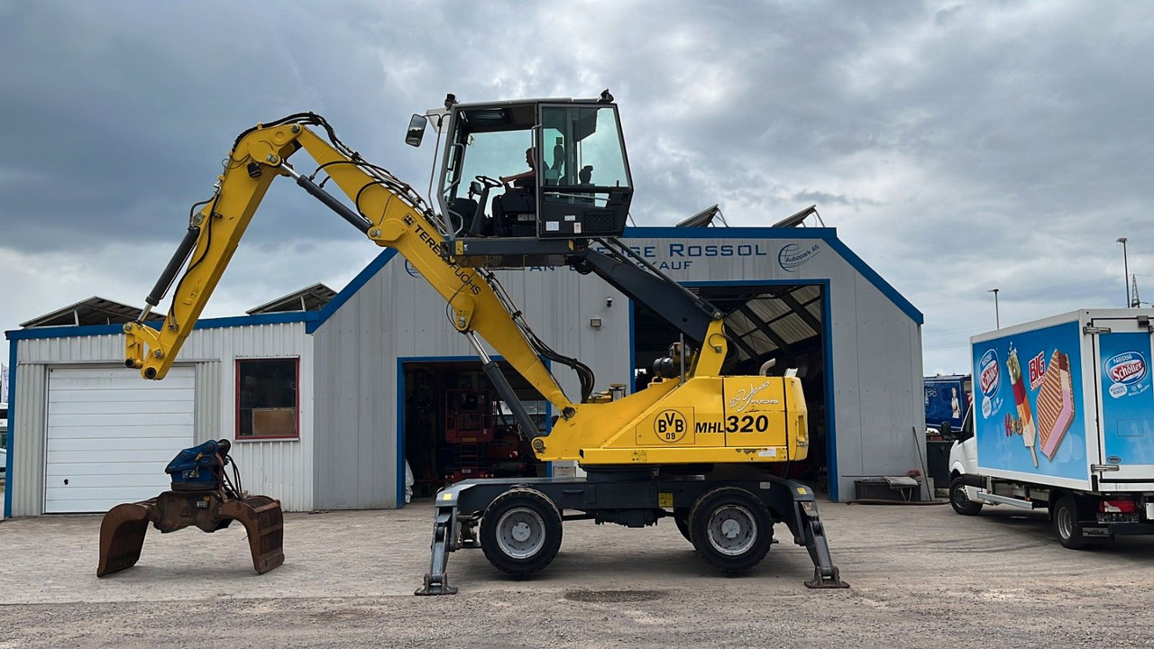 Fuchs TeRex MHL 320 D Umschlagbagger Greifer Pratzen - Překládkové rypadlo: obrázek 2 Fuchs TeRex MHL 320 D Umschlagbagger Greifer Pratzen - Překládkové rypadlo: obrázek 2