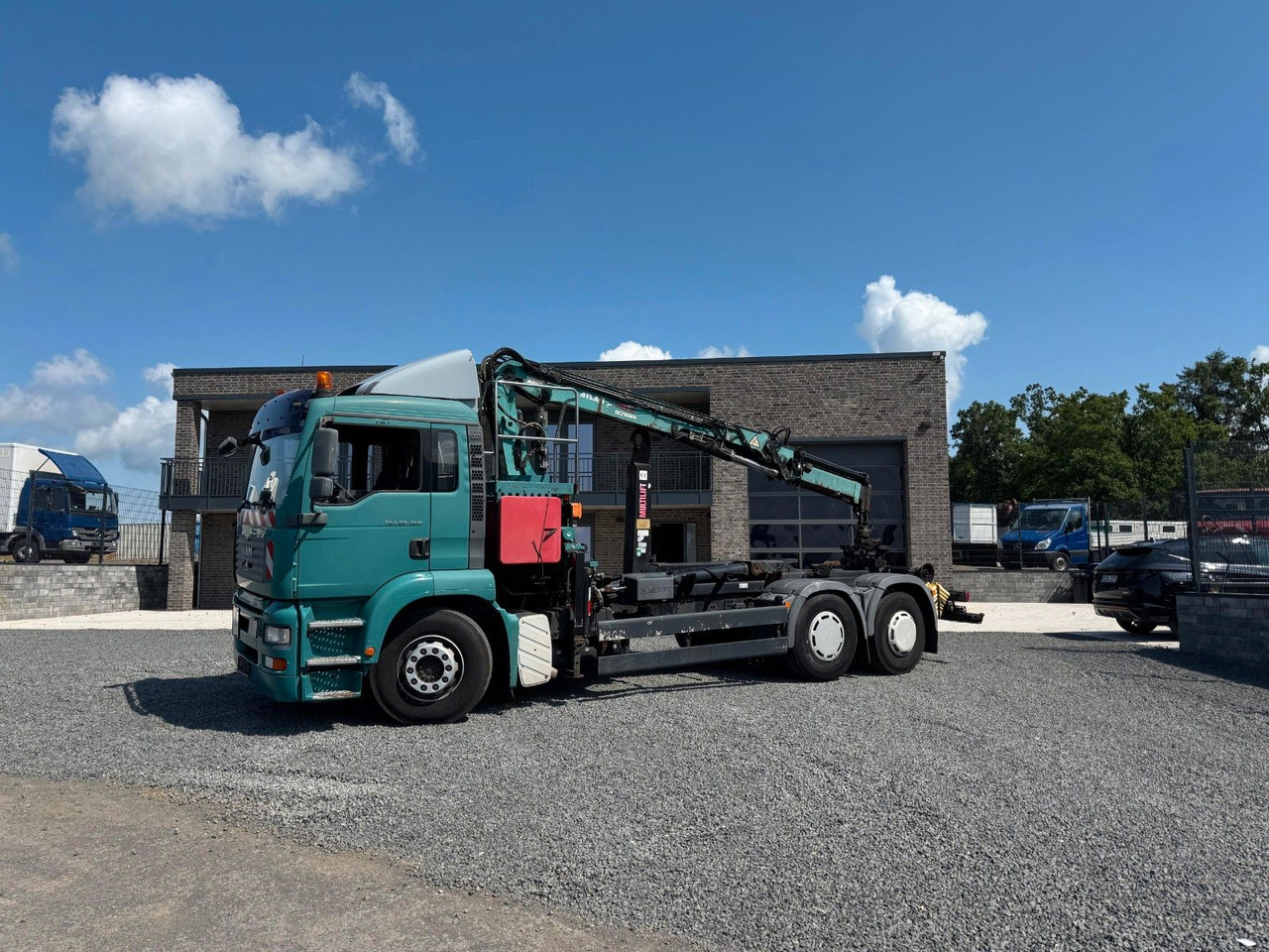 MAN TGA 26.360 Kran TeRex Multilift Fernbedienung - Hákový nosič kontejnerů, Auto s hydraulickou rukou: obrázek 1 MAN TGA 26.360 Kran TeRex Multilift Fernbedienung - Hákový nosič kontejnerů, Auto s hydraulickou rukou: obrázek 1