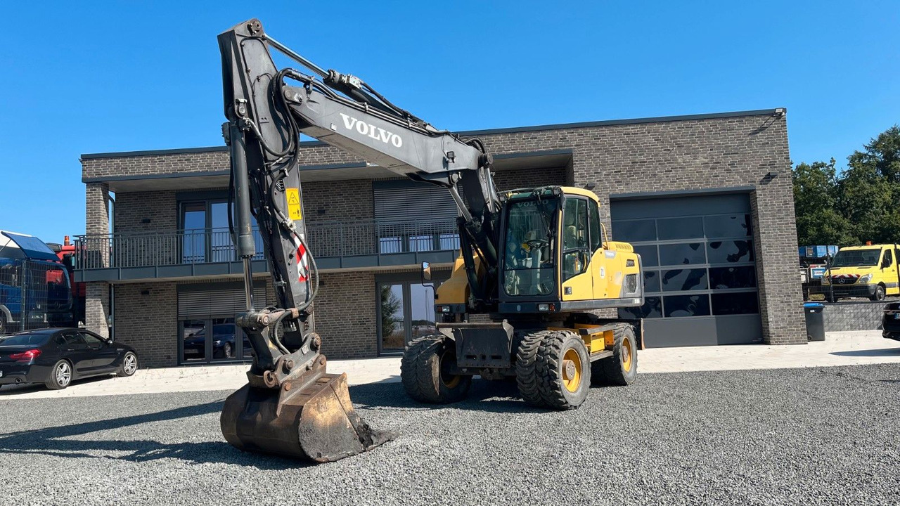 Volvo EW180D 20500 Kg Verstellausleger OilQuick - Kolesové rýpadlo: obrázek 1 Volvo EW180D 20500 Kg Verstellausleger OilQuick - Kolesové rýpadlo: obrázek 1