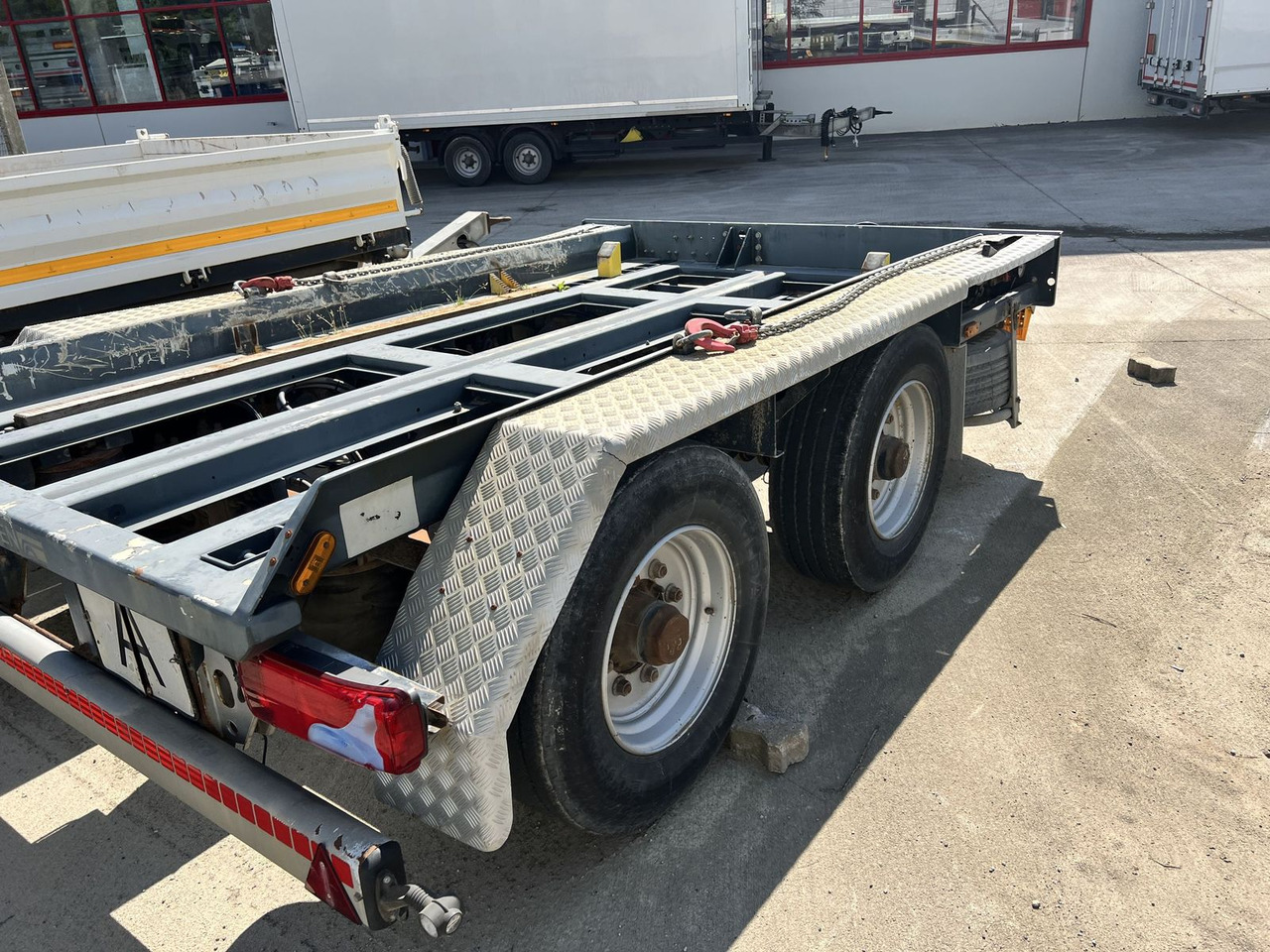Hüffermann Tandem- Absetzmuldenanhänger - Hákový/ Ramenový nosič přívěs: obrázek 4 Hüffermann Tandem- Absetzmuldenanhänger - Hákový/ Ramenový nosič přívěs: obrázek 4