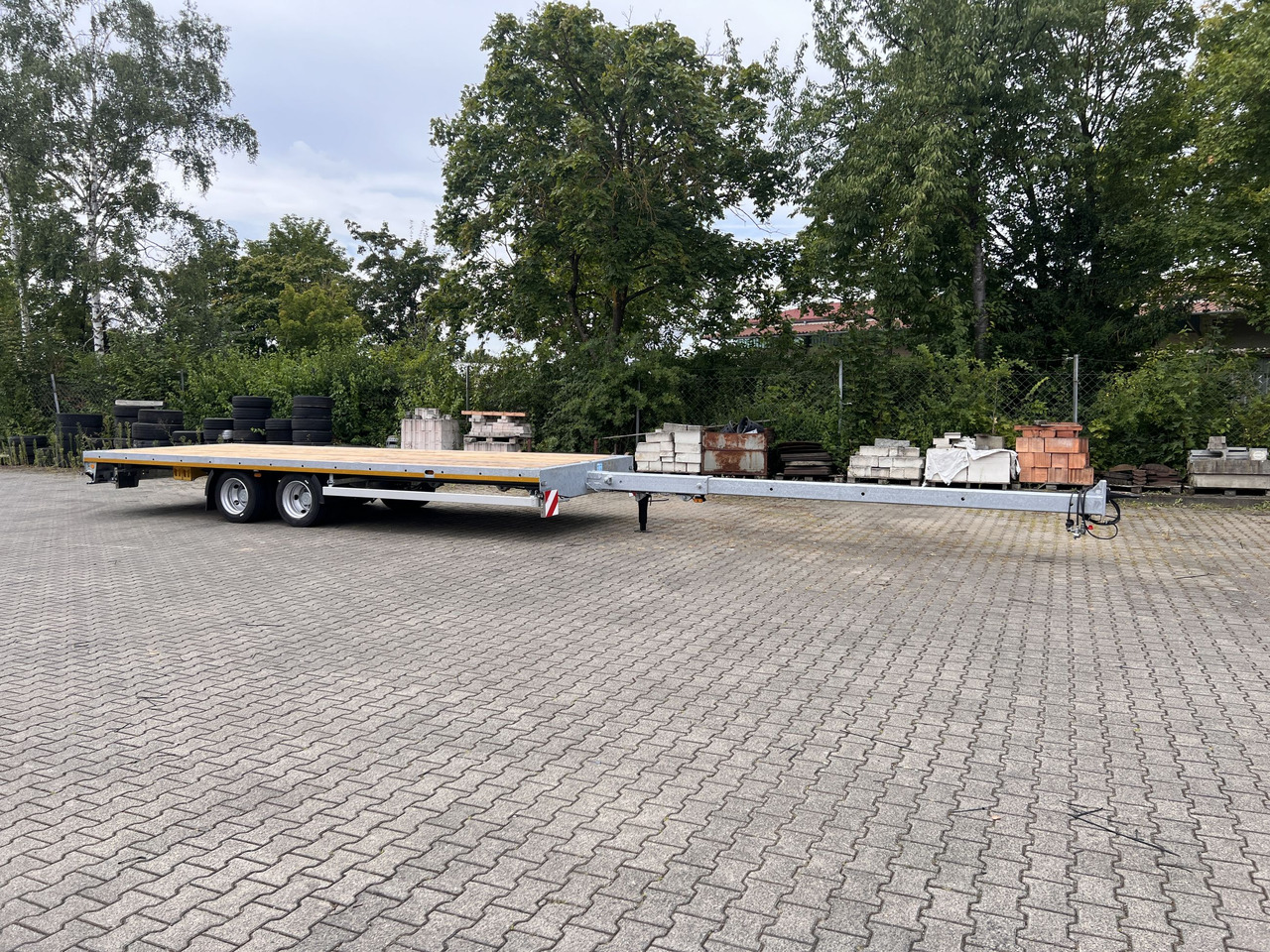 Möslein THT 11 G Ausziehbar 11,9 t Tandemanhänger- Tieflader, ausziehbar - Přívěs plato/ Valník: obrázek 1 Möslein THT 11 G Ausziehbar 11,9 t Tandemanhänger- Tieflader, ausziehbar - Přívěs plato/ Valník: obrázek 1