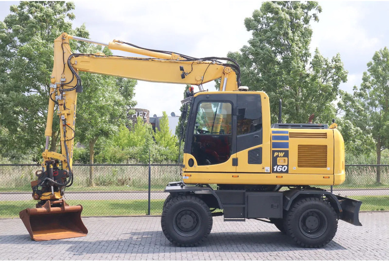 Komatsu PW 160-10 | ROTOTILT | NEW TIRES - Kolesové rýpadlo: obrázek 1 Komatsu PW 160-10 | ROTOTILT | NEW TIRES - Kolesové rýpadlo: obrázek 1