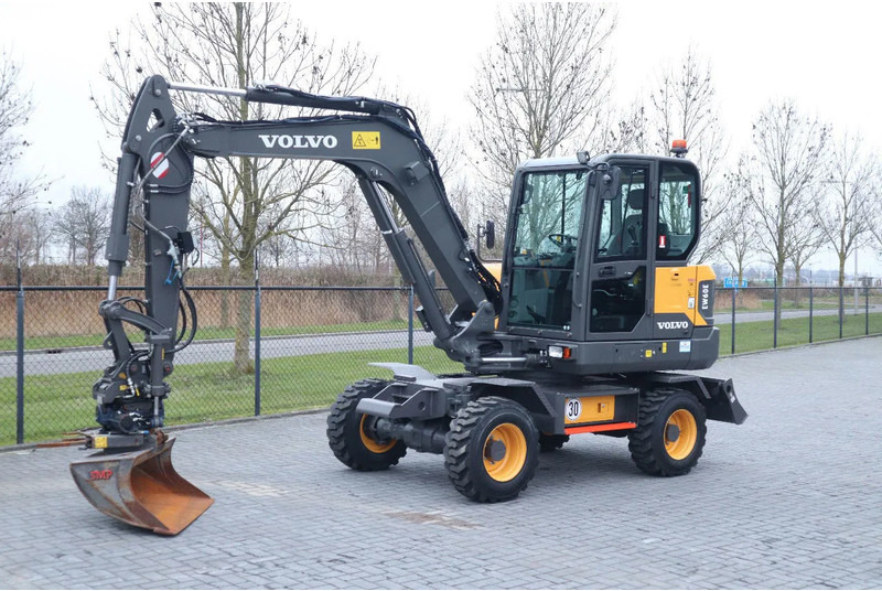 Volvo EW60E | DEMO | 30 KM/H | ROTOTILT + GRIPPER | BUCKET - Kolesové rýpadlo: obrázek 2 Volvo EW60E | DEMO | 30 KM/H | ROTOTILT + GRIPPER | BUCKET - Kolesové rýpadlo: obrázek 2