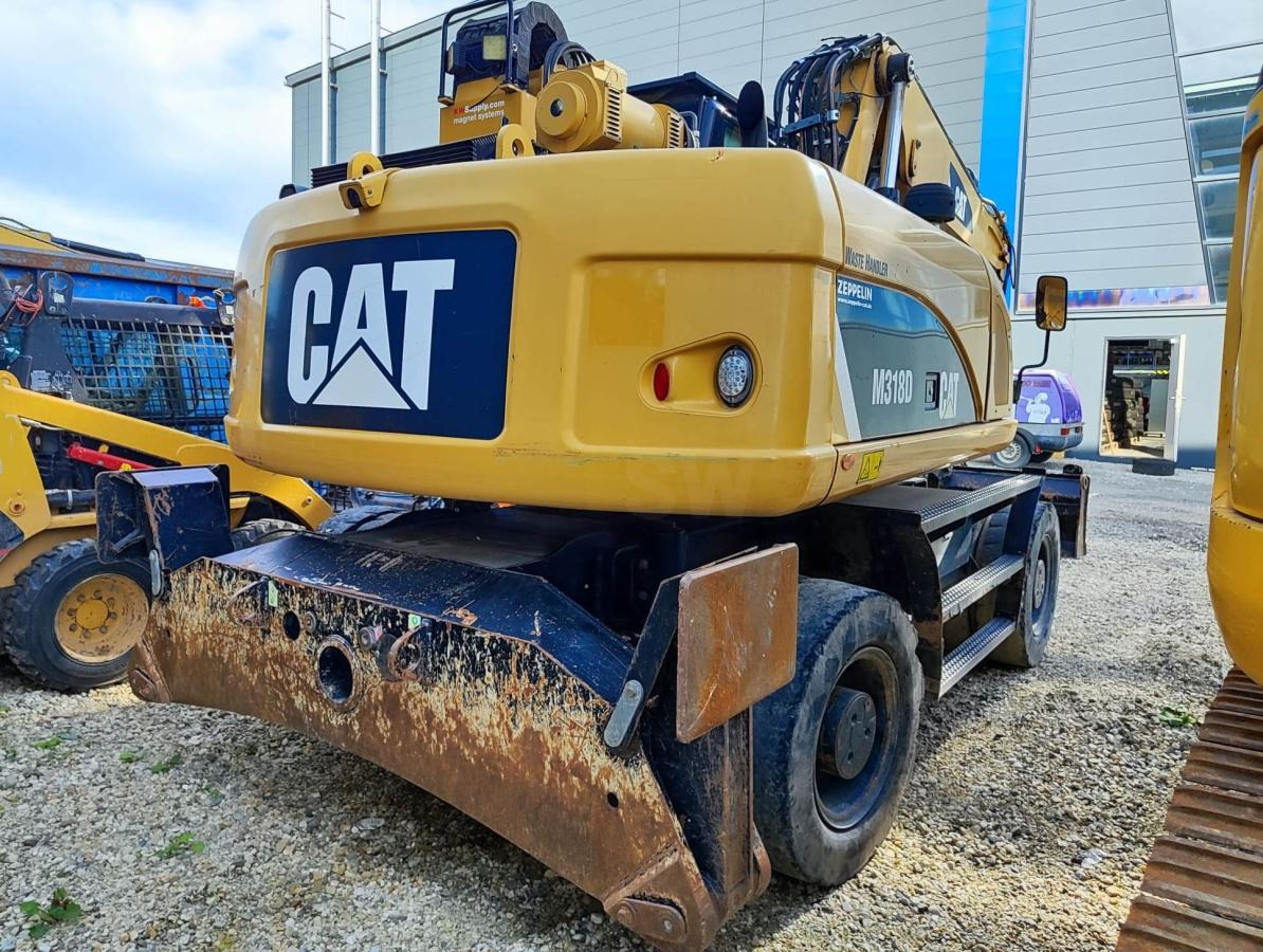 Caterpillar M318D MH - Kolesové rýpadlo: obrázek 4 Caterpillar M318D MH - Kolesové rýpadlo: obrázek 4