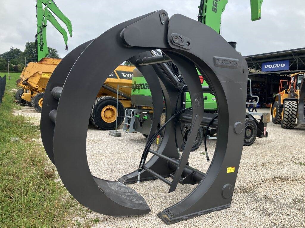 Volvo Holzgreifer mit Ausstoßer - Drapák: obrázek 1 Volvo Holzgreifer mit Ausstoßer - Drapák: obrázek 1