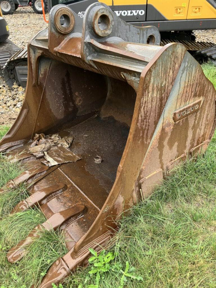 Volvo Tieflöffel mit Zähnen - Festanbau - Rýpadlo-nakladač: obrázek 1 Volvo Tieflöffel mit Zähnen - Festanbau - Rýpadlo-nakladač: obrázek 1