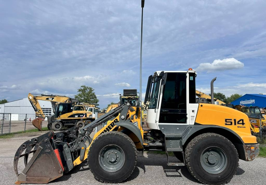 Liebherr L 514 Stereo +30 Kmh Klima 3er Kreis Greifschaufel - Kolový nakladač: obrázek 1 Liebherr L 514 Stereo +30 Kmh Klima 3er Kreis Greifschaufel - Kolový nakladač: obrázek 1