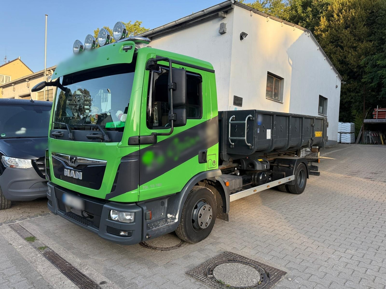 MAN TGL 10.180 4x2 BL TGL 10.180 4x2 BL City-Abrollkipper - Hákový nosič kontejnerů: obrázek 1 MAN TGL 10.180 4x2 BL TGL 10.180 4x2 BL City-Abrollkipper - Hákový nosič kontejnerů: obrázek 1