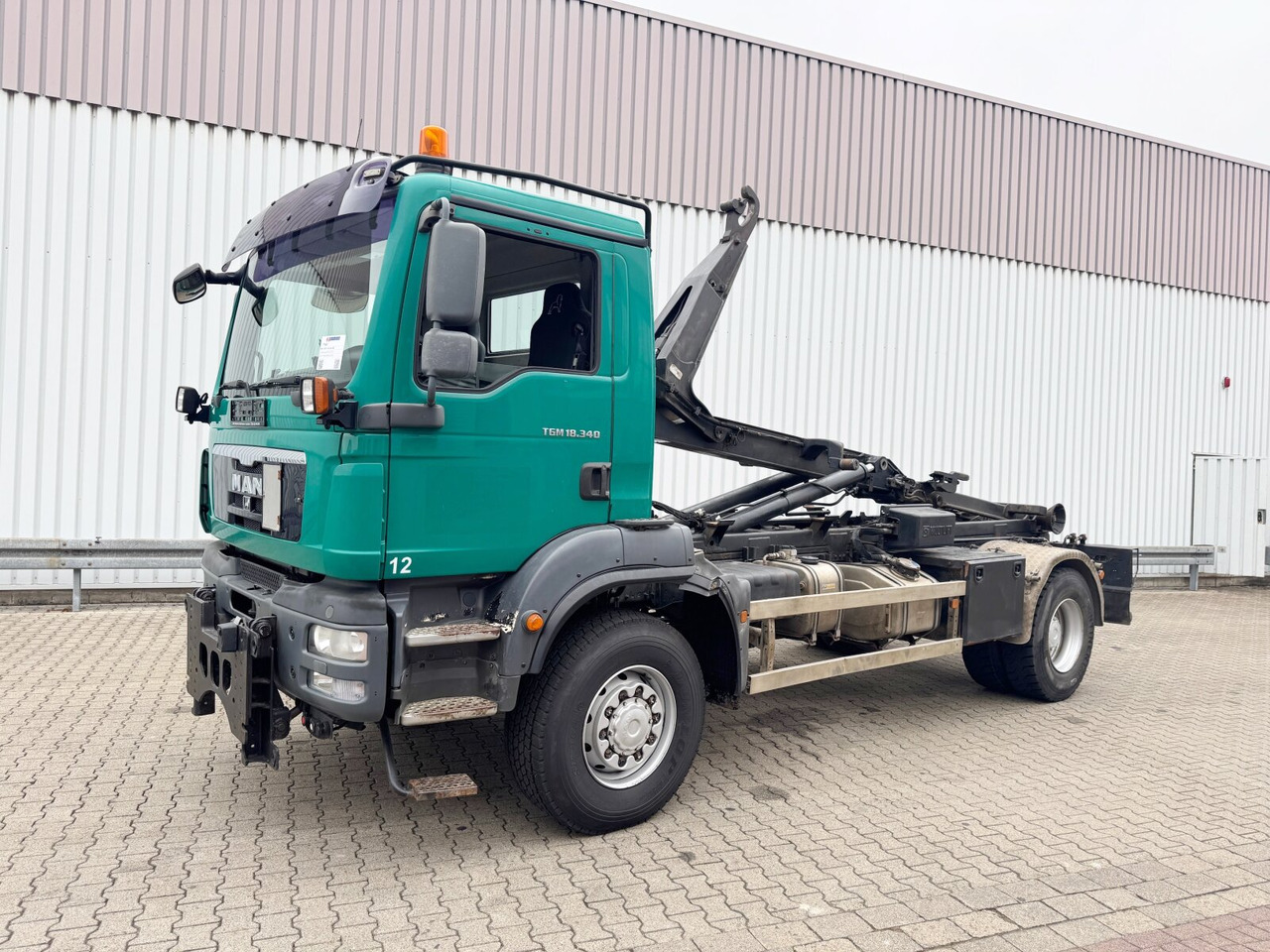 MAN TGM 18.340 4x4 BB TGM 18.340 4x4 BB, Hiab LHT 19046 Abrollkipper, Widi Platte - Hákový nosič kontejnerů: obrázek 1 MAN TGM 18.340 4x4 BB TGM 18.340 4x4 BB, Hiab LHT 19046 Abrollkipper, Widi Platte - Hákový nosič kontejnerů: obrázek 1