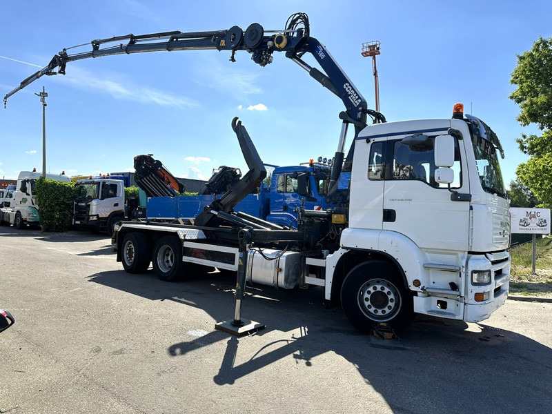 MAN TGA 26.310 6X2 HOOKLIFT + CRANE COPMA 160.4 + JIB J2 + WINCH - RADIO - LIFT + STEERING AXLE - EURO 3 - BE - Hákový nosič kontejnerů, Auto s hydraulickou rukou: obrázek 1 MAN TGA 26.310 6X2 HOOKLIFT + CRANE COPMA 160.4 + JIB J2 + WINCH - RADIO - LIFT + STEERING AXLE - EURO 3 - BE - Hákový nosič kontejnerů, Auto s hydraulickou rukou: obrázek 1