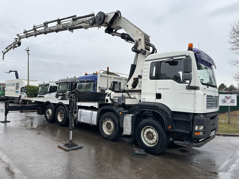 MAN TGA 35.430 8x2 + KRAN HIAB 700 E-6 + JIB 165X-3 - RETARDER - PRITSCHE 6m70~8m50 EXTENDABLE - MANUAL GEARBOX ZF - LIFT + STEERING AXLE - Nákladní automobil valníkový/ Plošinový, Auto s hydraulickou rukou: obrázek 1 MAN TGA 35.430 8x2 + KRAN HIAB 700 E-6 + JIB 165X-3 - RETARDER - PRITSCHE 6m70~8m50 EXTENDABLE - MANUAL GEARBOX ZF - LIFT + STEERING AXLE - Nákladní automobil valníkový/ Plošinový, Auto s hydraulickou rukou: obrázek 1