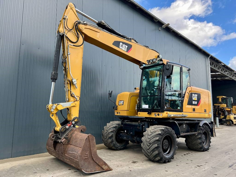 Kolesové rýpadlo Cat M318F: obrázek 1