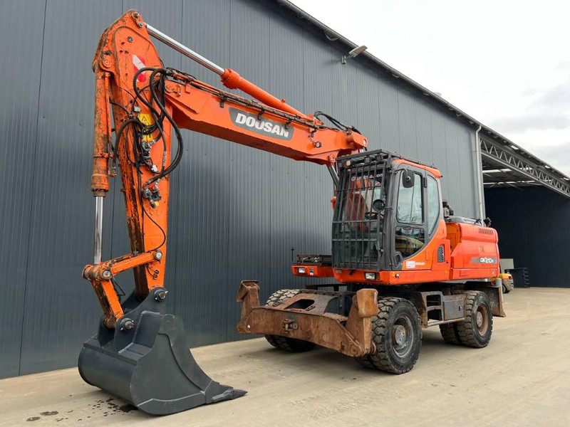 Doosan DX210W - Kolesové rýpadlo: obrázek 1 Doosan DX210W - Kolesové rýpadlo: obrázek 1