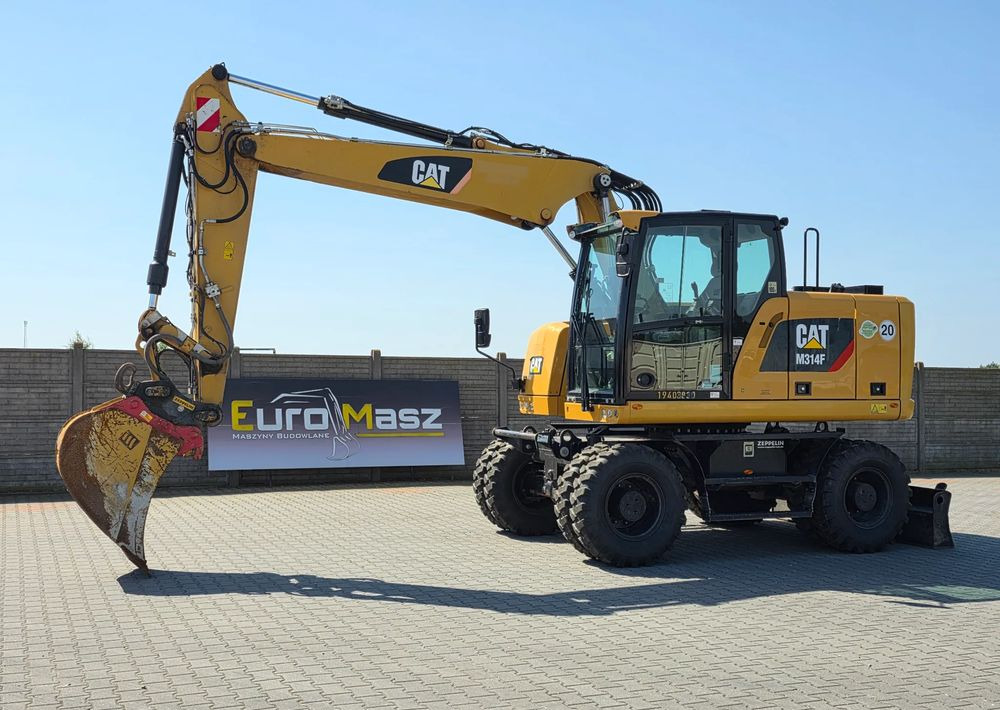 Caterpillar M314F, 2019 ROK, 3300 MTH, OIL QUICK OQ 65 - Kolesové rýpadlo: obrázek 1 Caterpillar M314F, 2019 ROK, 3300 MTH, OIL QUICK OQ 65 - Kolesové rýpadlo: obrázek 1
